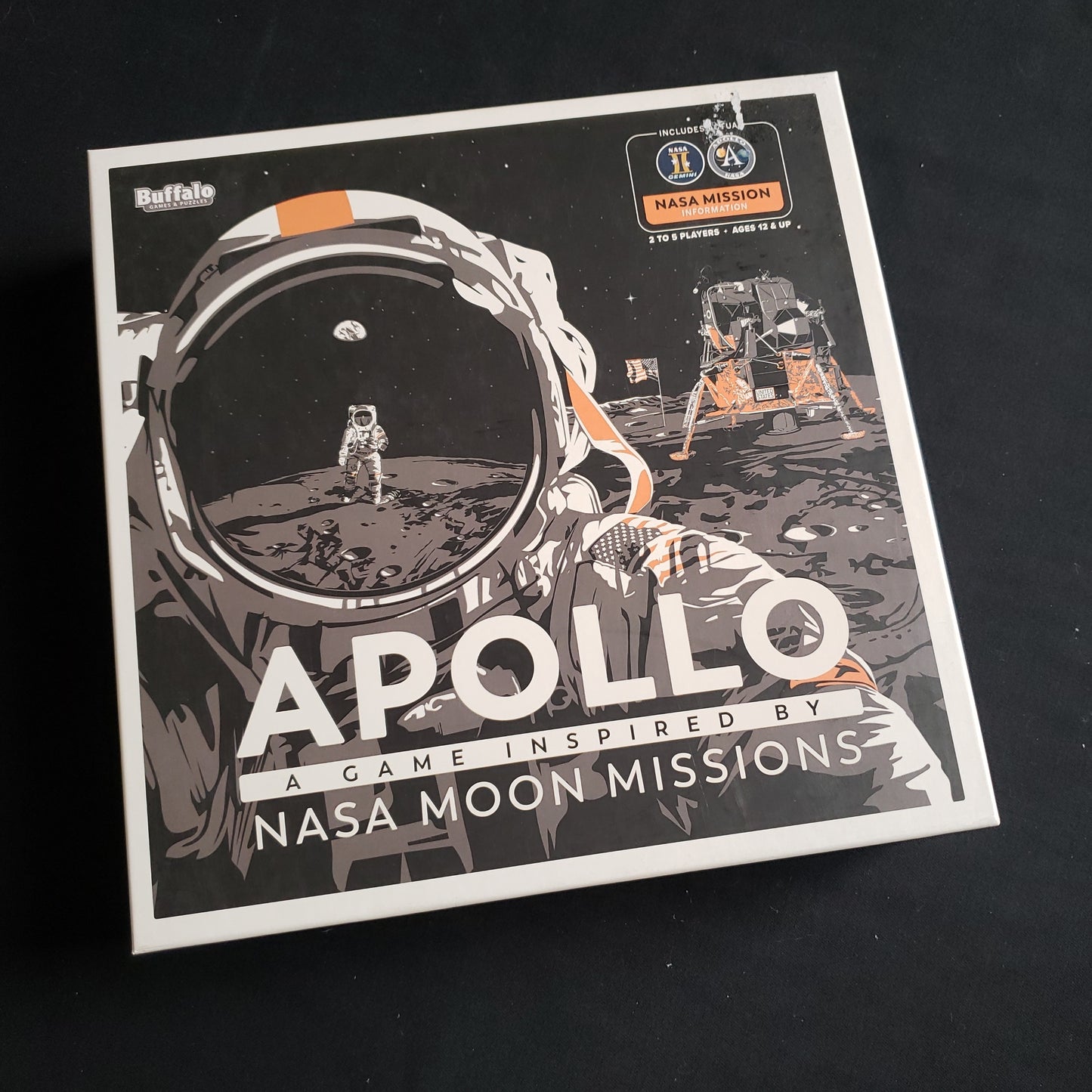 Image shows the front cover of the box of the Apollo board game