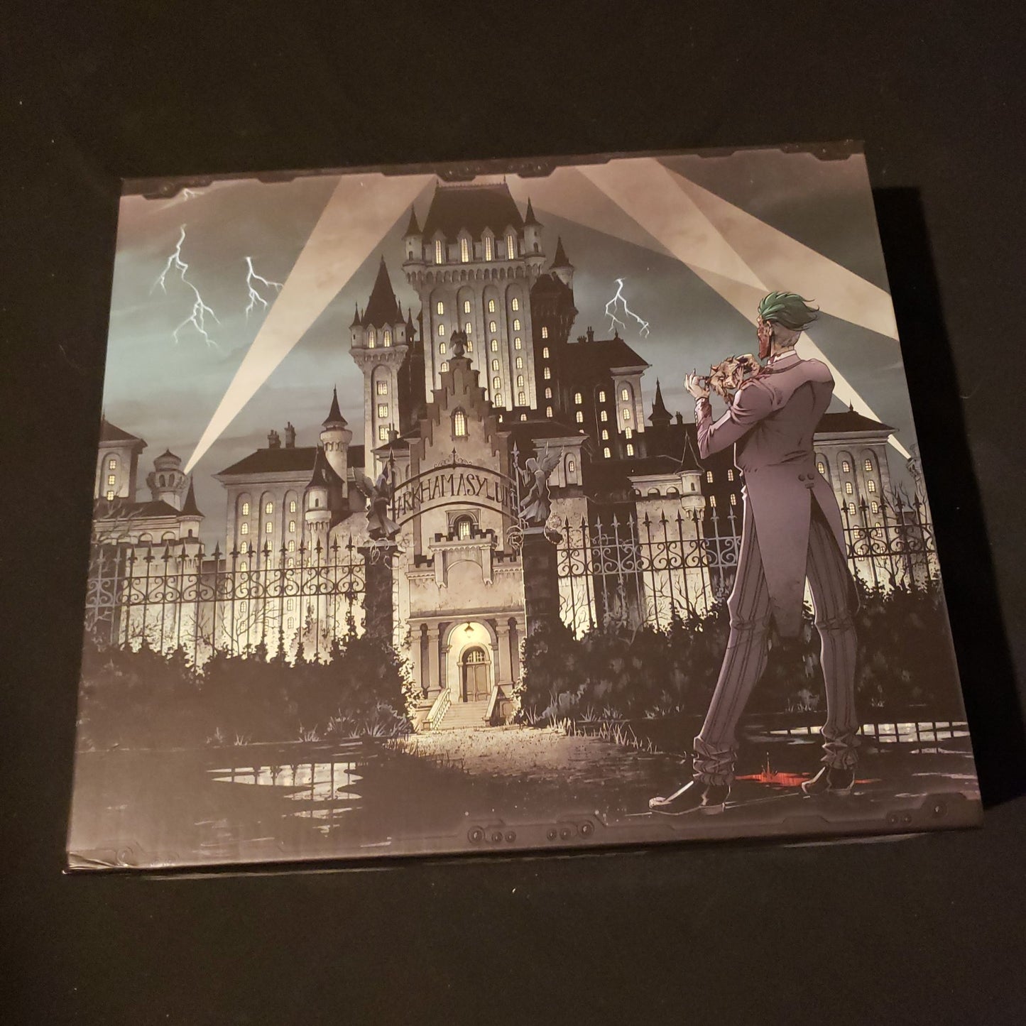 Image shows the front of the box for the Arkham Asylum expansion for the Batman: Gotham City Chronicles board game