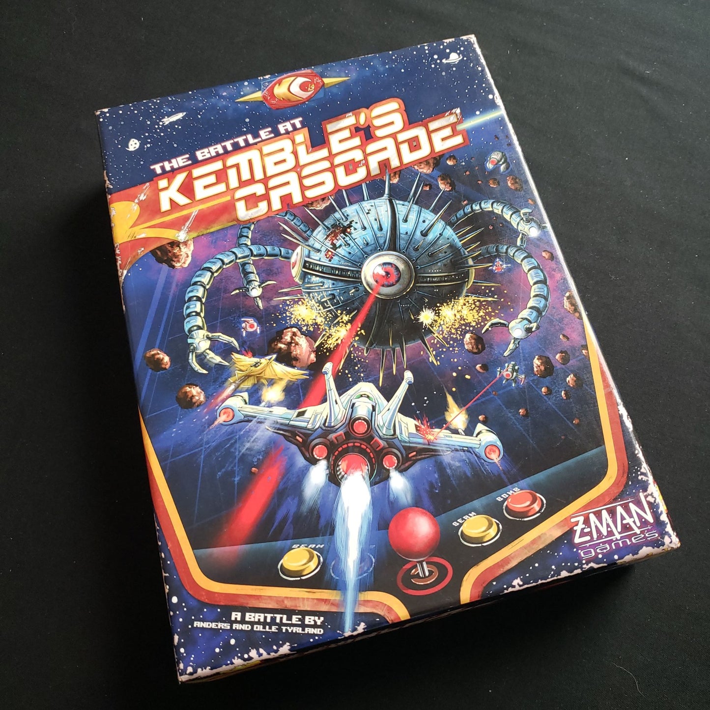 Image shows the front cover of the box of the Battle At Kemble's Cascade board game