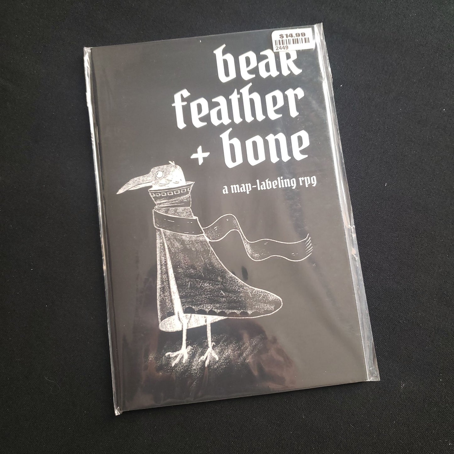 Beak feather and bone map-labeling rpg - front cover of book