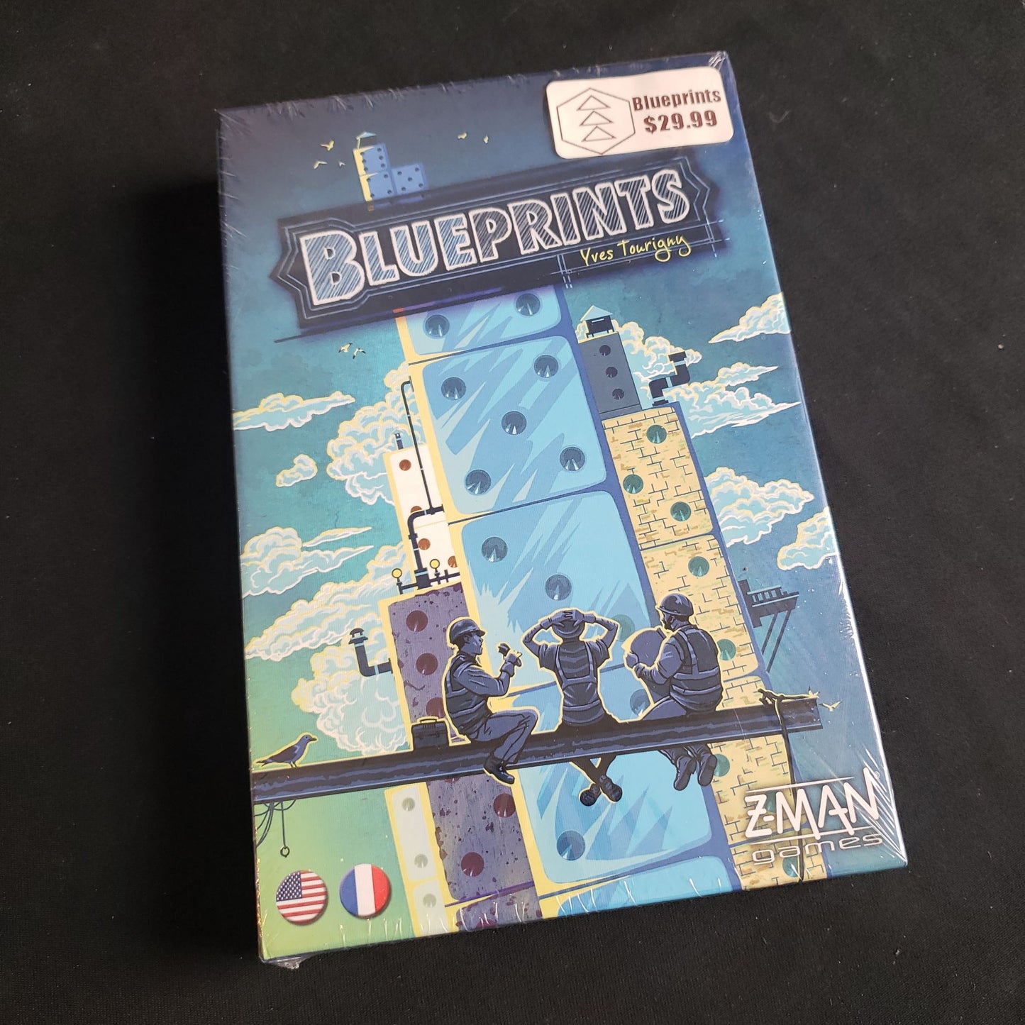 Image shows the front cover of the box of the Blueprints board game