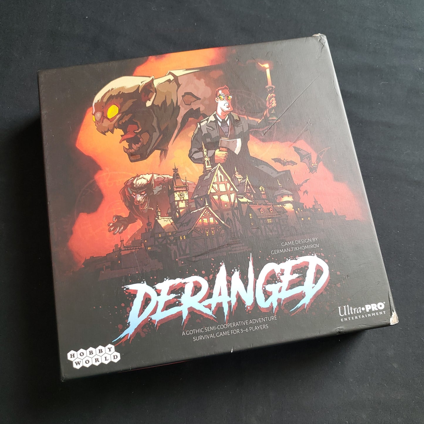 Image shows the front cover of the box of the Deranged board game