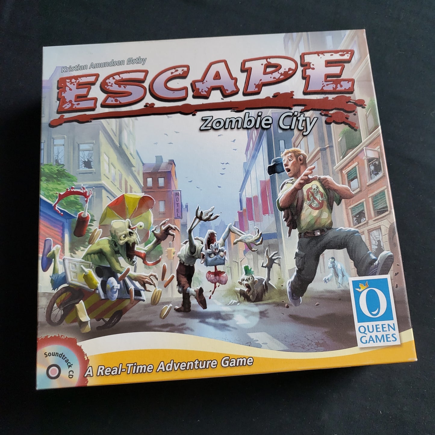 Image shows the front cover of the box of the Escape: Zombie City board game