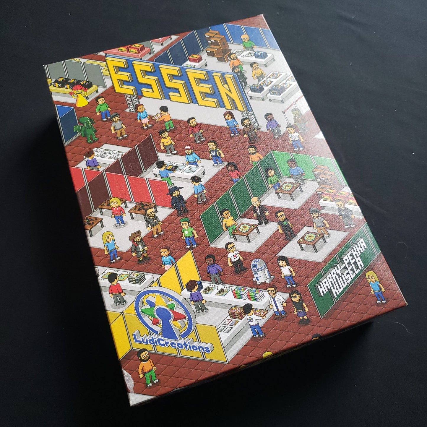 Image shows the front cover of the box of the Essen board game