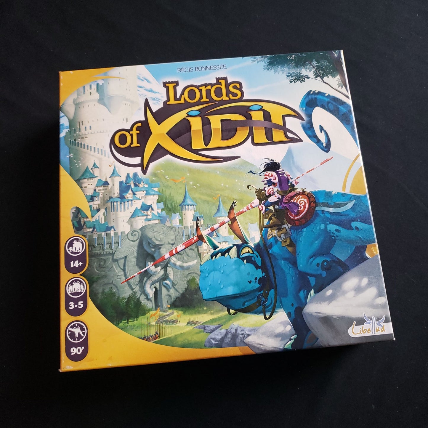Image shows the front cover of the box of the Lords Of Xidit board game