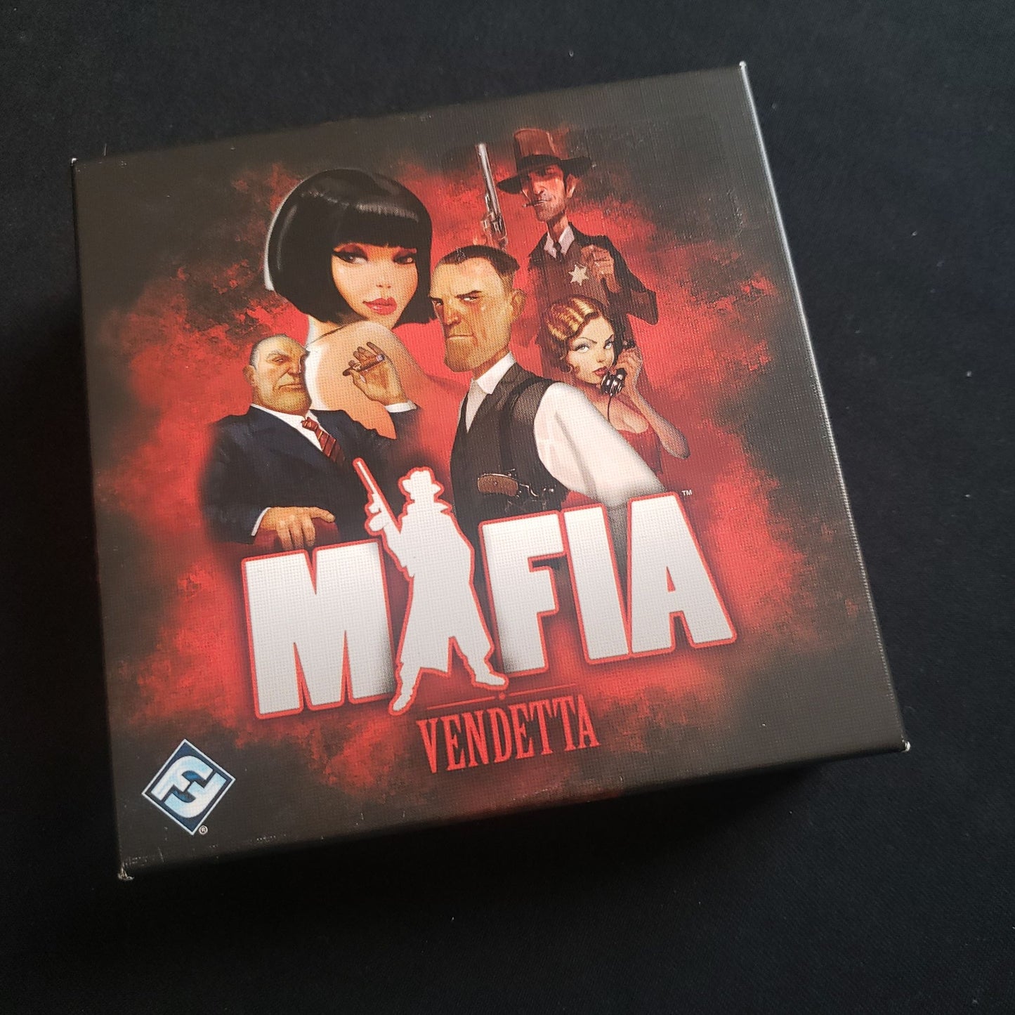 Image shows the front cover of the box of the Mafia: Vendetta card game