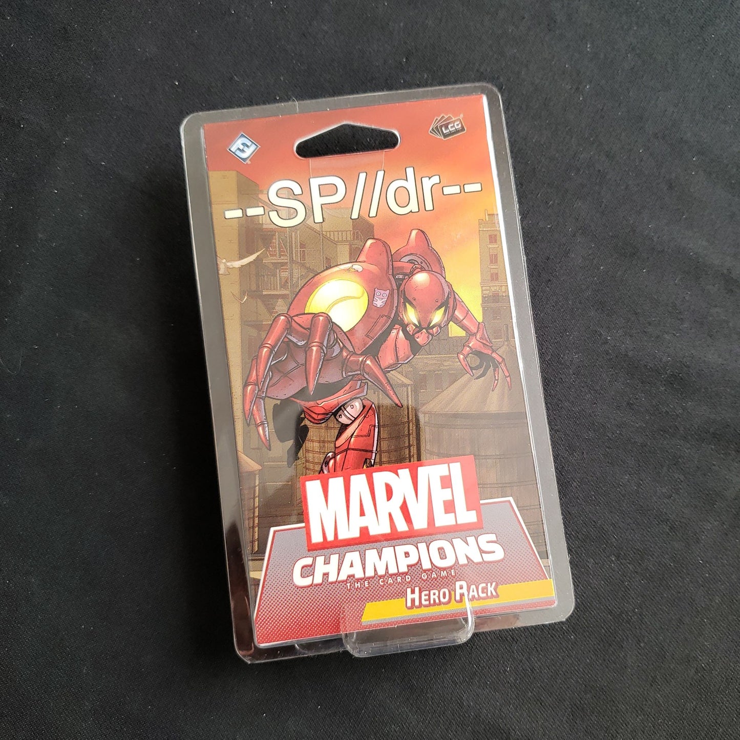 Image shows the front of the package for the SP//dr Hero Pack for the Marvel Champions card game