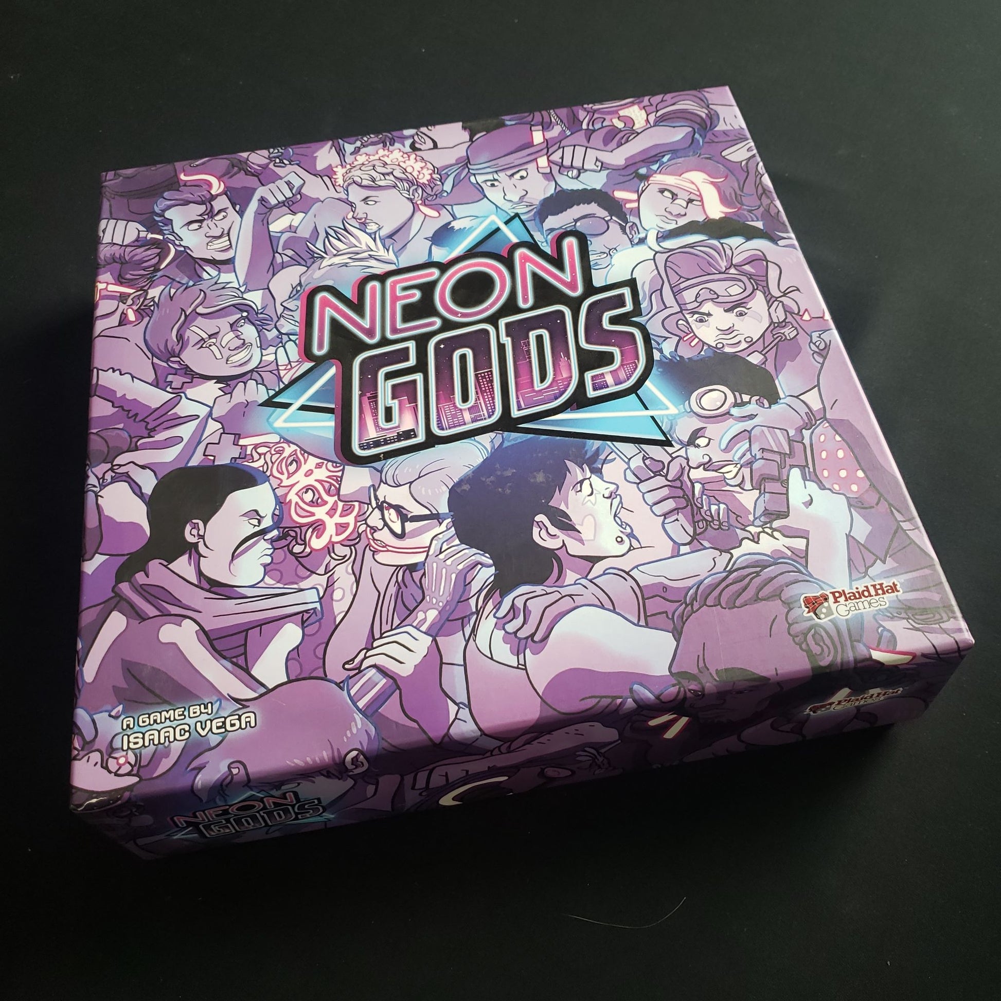 Image shows the front cover of the box for the Neon Gods board game