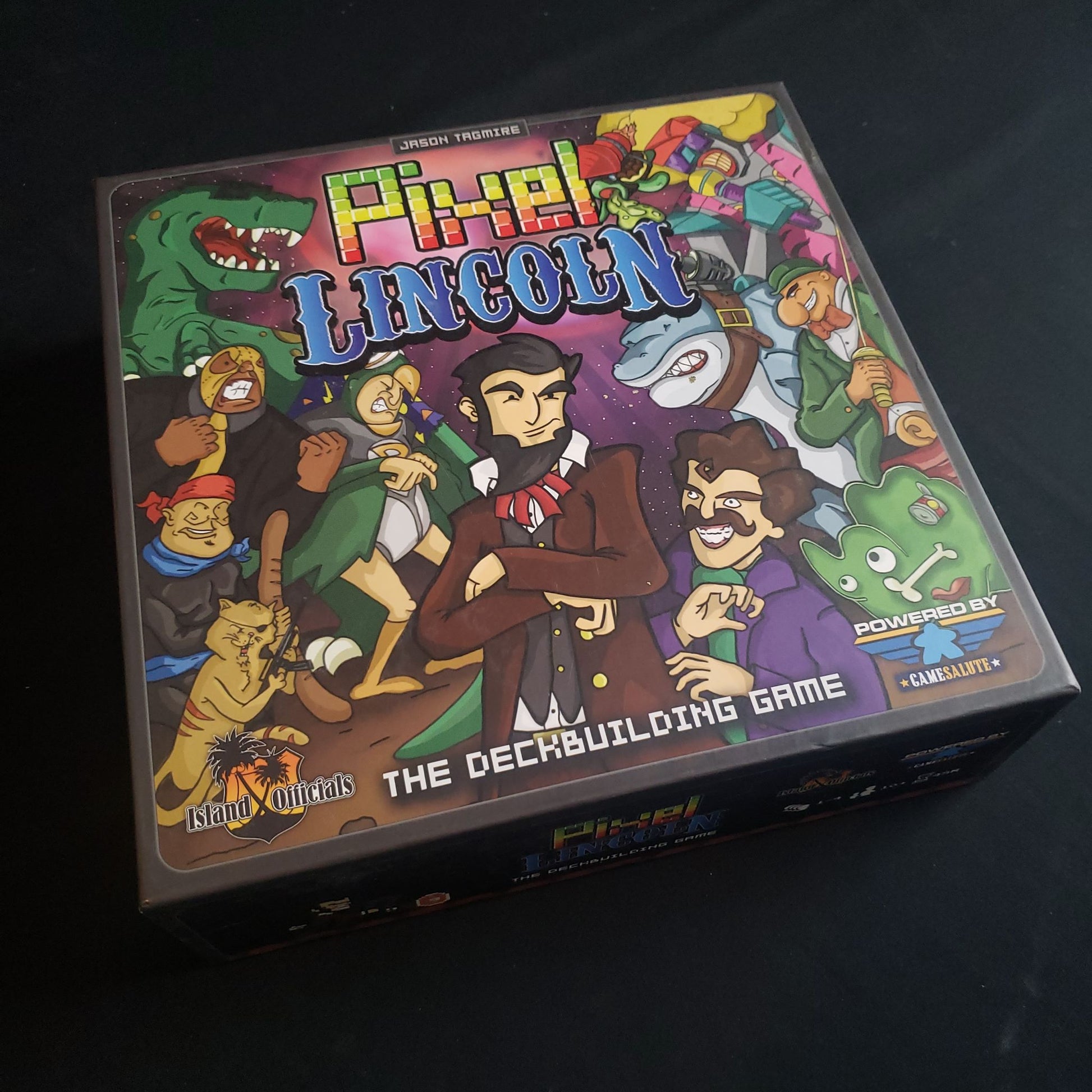 Image shows the front cover of the box of Pixel Lincoln: The Deckbuilding Game