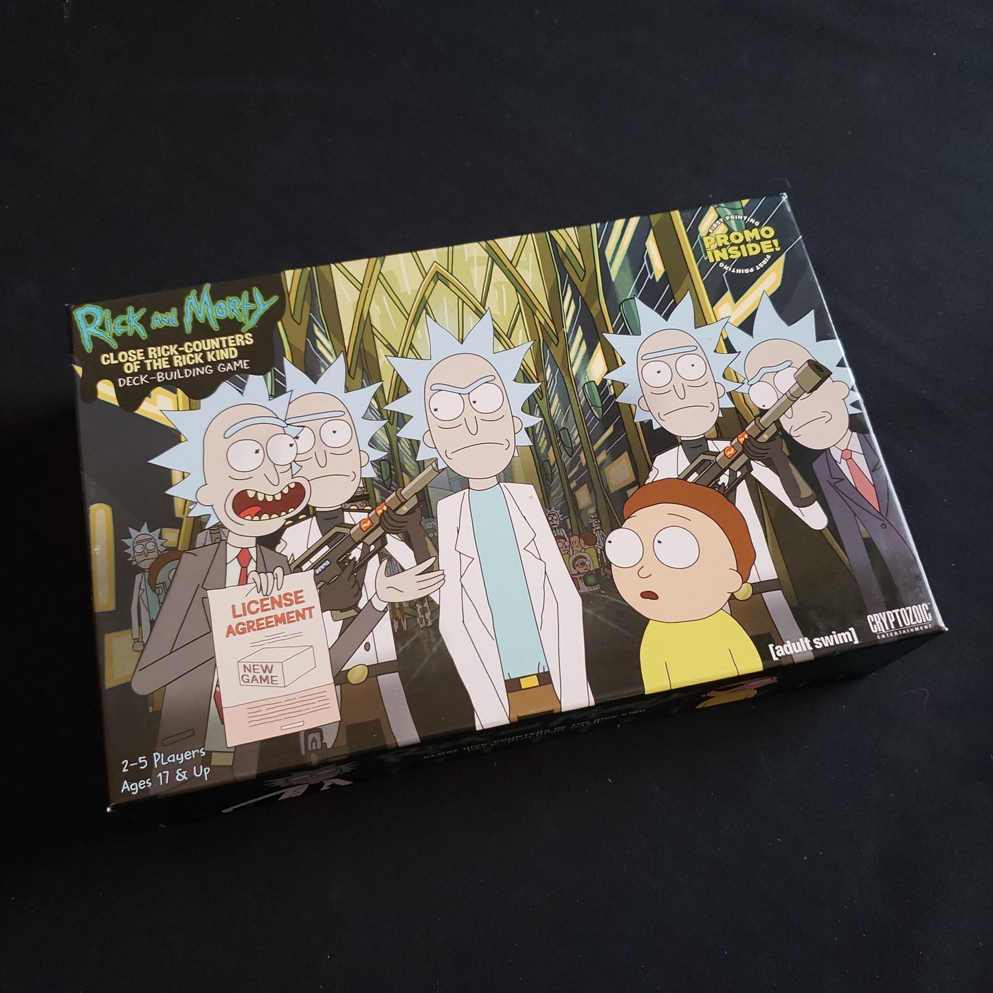 Image shows the front cover of the box of the Rick & Morty: Close Rick-counters of the Rick Kind Deckbuilding Game