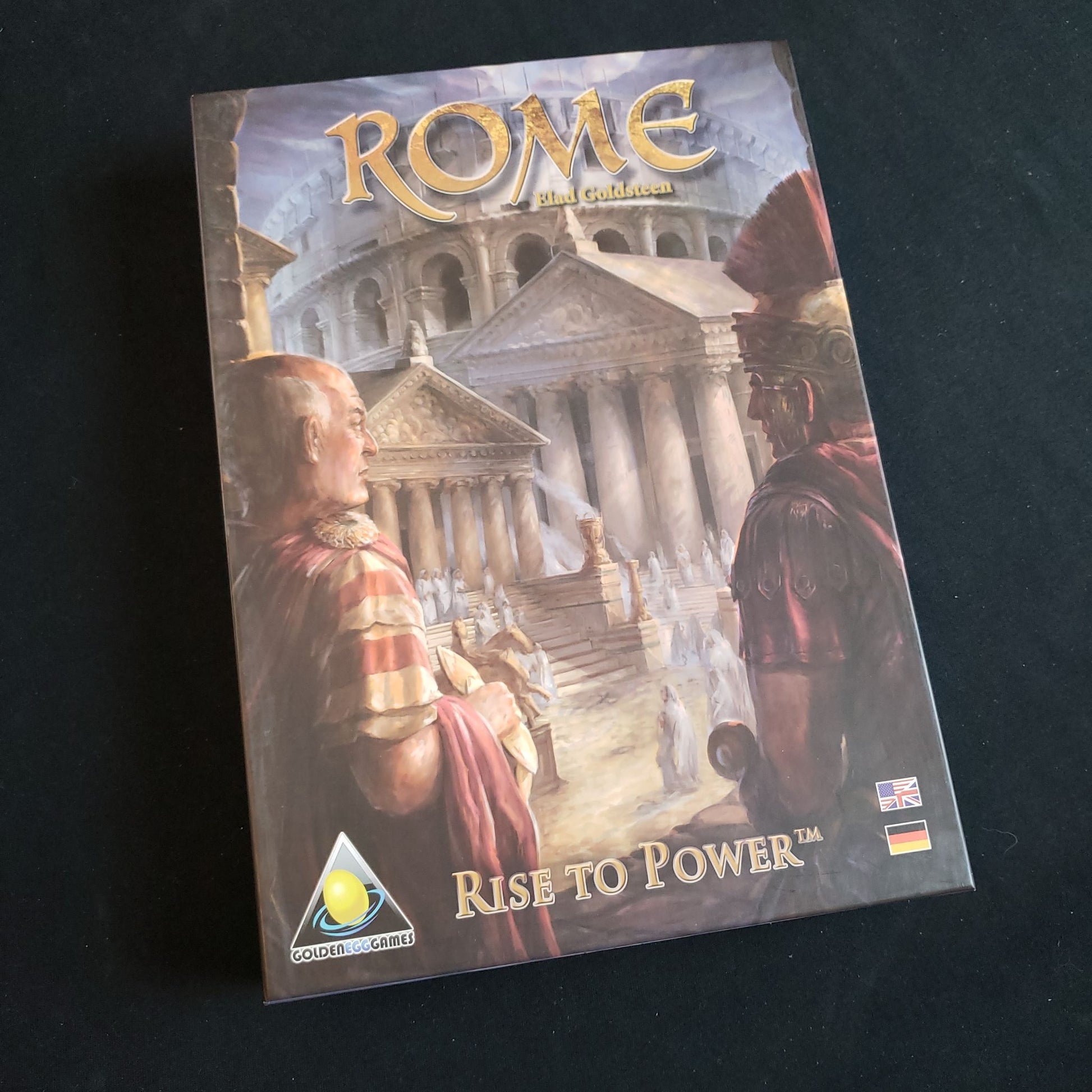 Image shows the front cover of the box of the Rome: Rise to Power board game