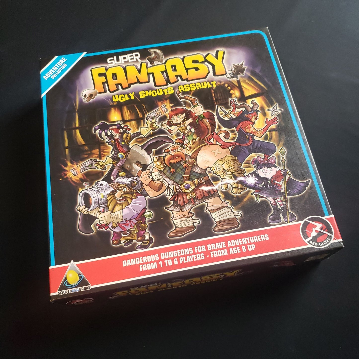 Image shows the front cover of the box of the Super Fantasy: Ugly Snout's Assault board game