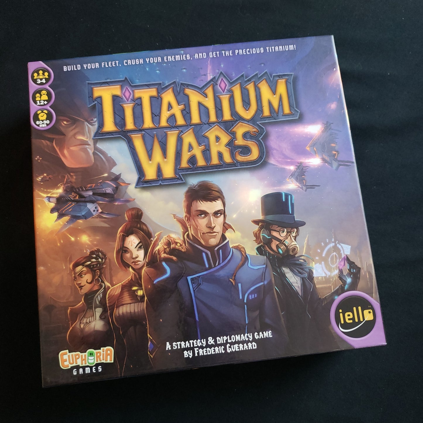 Image shows the front cover of the box of the Titanium Wars board game