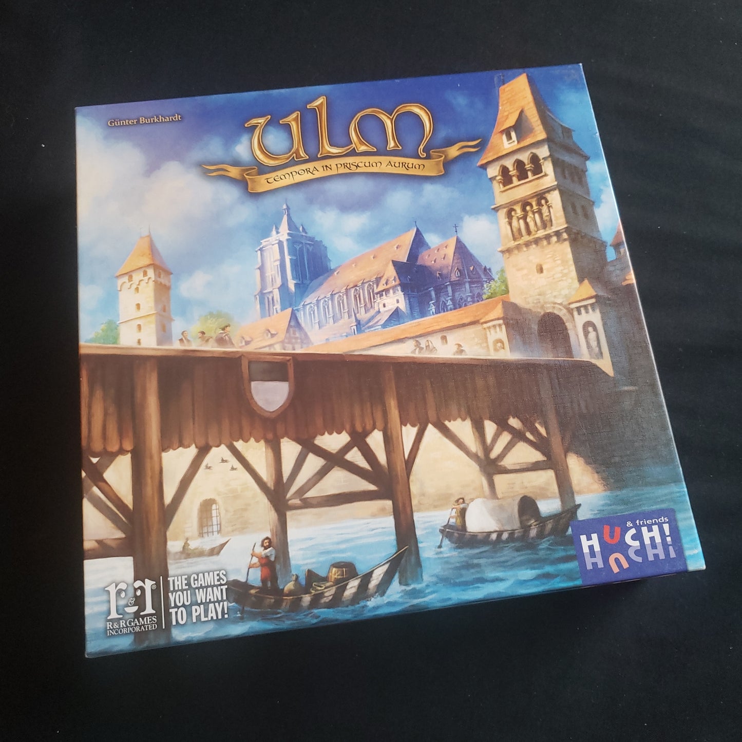 Image shows the front cover of the box of the Ulm board game
