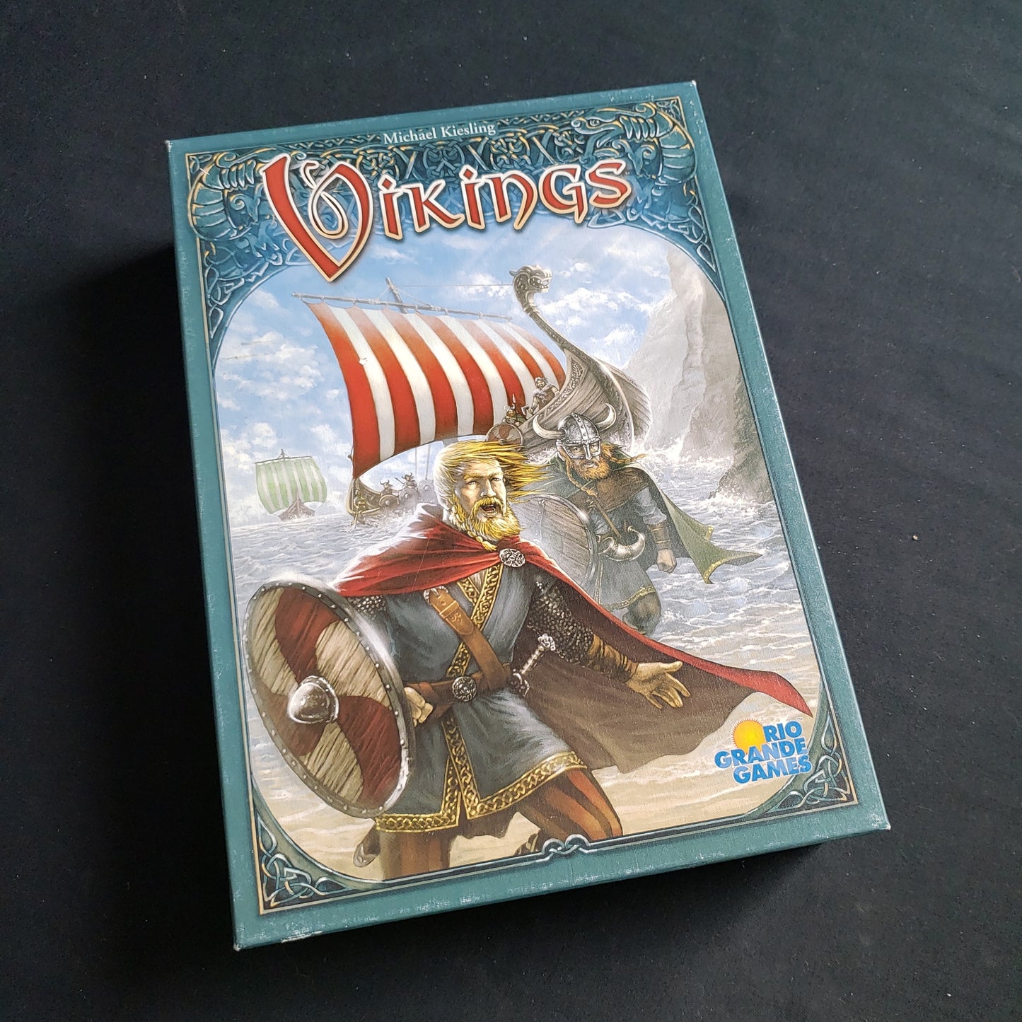 Image shows the front cover of the box of the Vikings board game