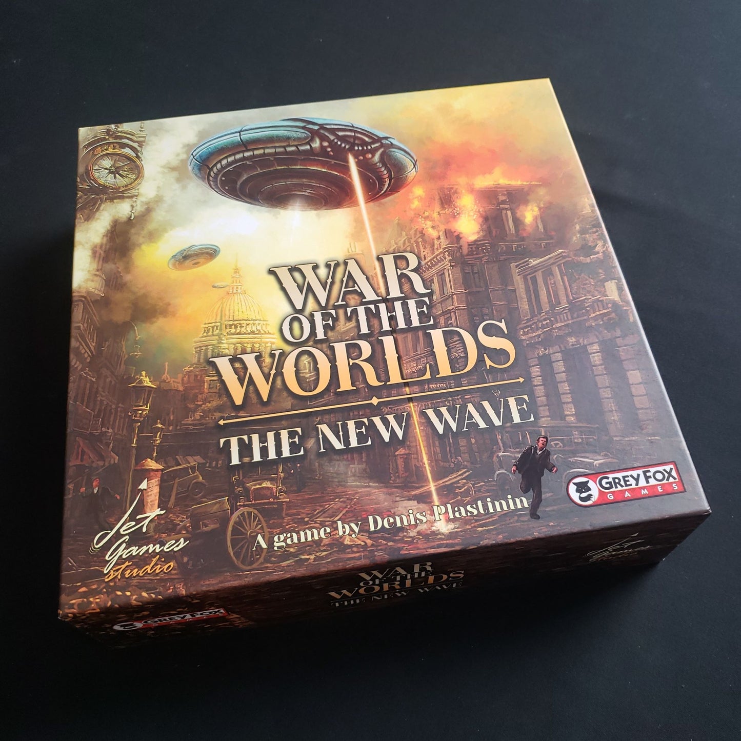 Image shows the front cover of the box for the War of the Worlds: The New Wave board game
