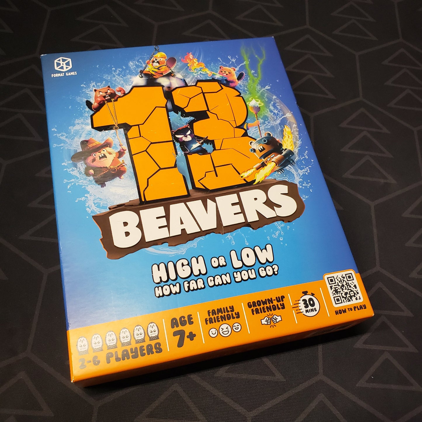 Image shows the front cover of the box for the 13 Beavers board game