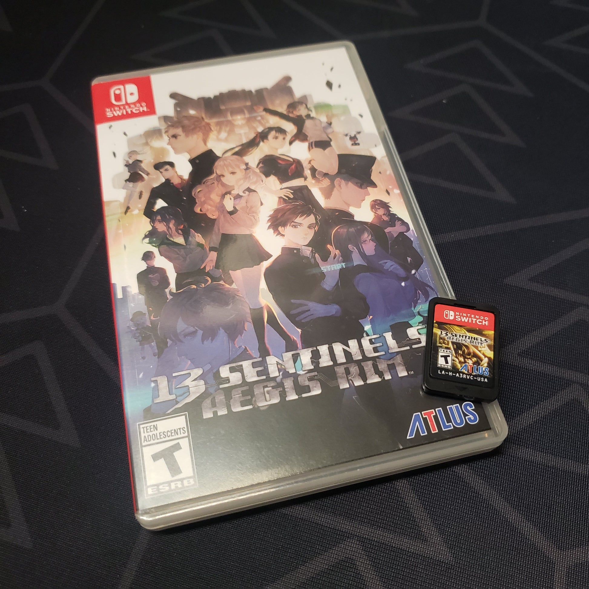 Image shows the case & cartridge for the video game 13 Sentinels: Aegis Rim for Nintendo Switch