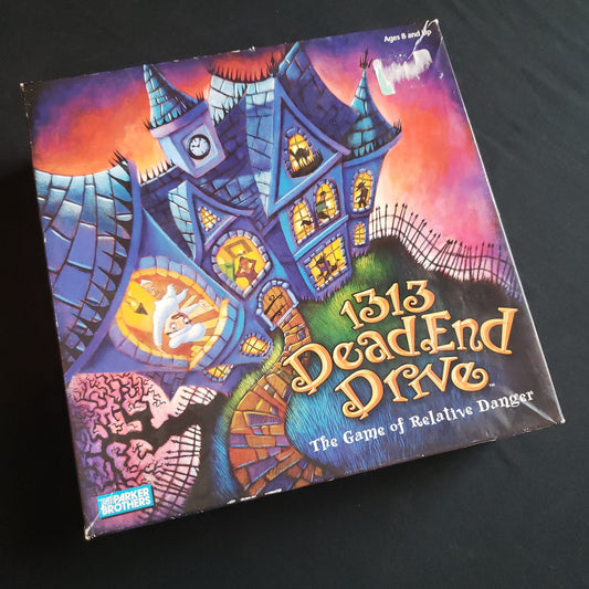 Image shows the front cover of the box of the 1313 Dead End Drive board game