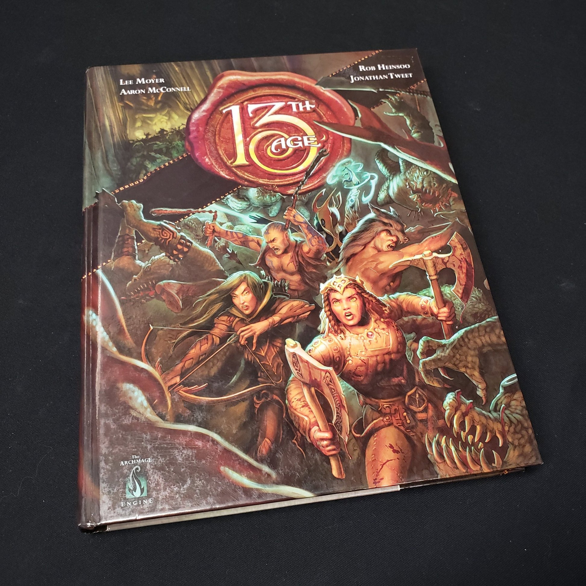 Image shows the front cover of the core rulebook for the roleplaying game 13th Age