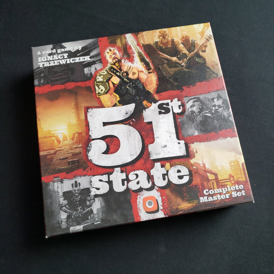 Image shows the front cover of the box of the Complete Master Set edition of the card game 51st State