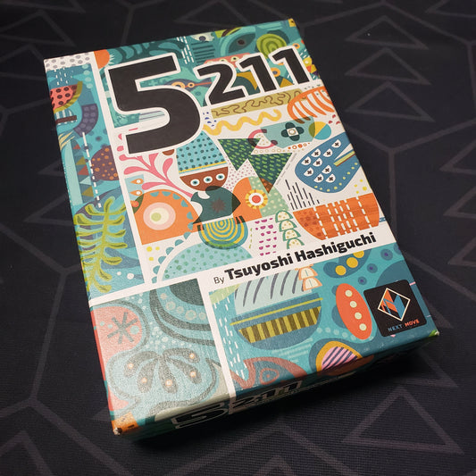 Image shows the front cover of the box for the 5211 card game