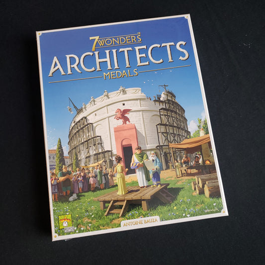 Image shows the front cover of the box of the Medals expansion for the board game 7 Wonders: Architects