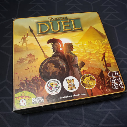 Image shows the front cover of the box of the 7 Wonders Duel board game