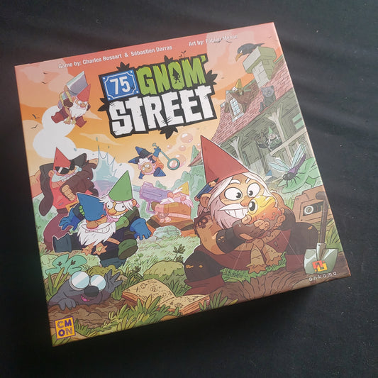 Image shows the front cover of the box of the 75 Gnom' Street board game