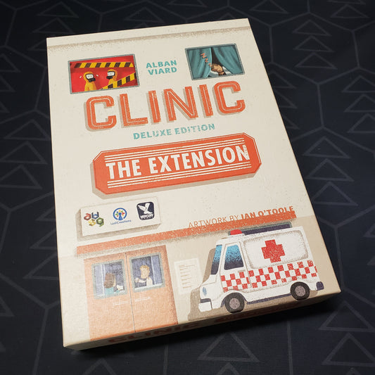 Image shows the front of the box for the Extension expansion for the board game Clinic: Deluxe Edition