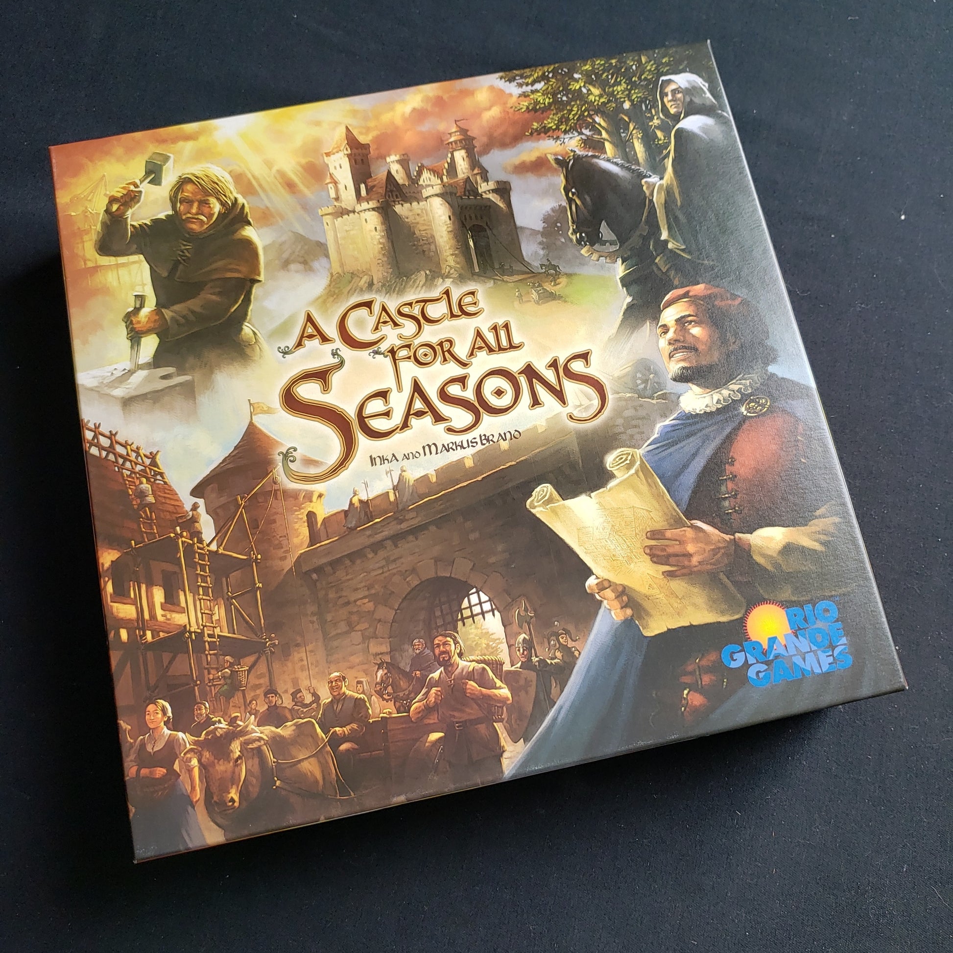 Image shows the front cover of the box of the board game A Castle for All Seasons