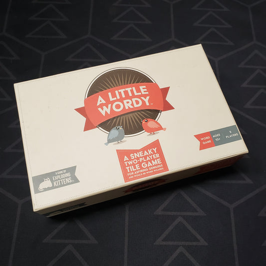 Image shows the front cover of the box for the board game A Little Wordy