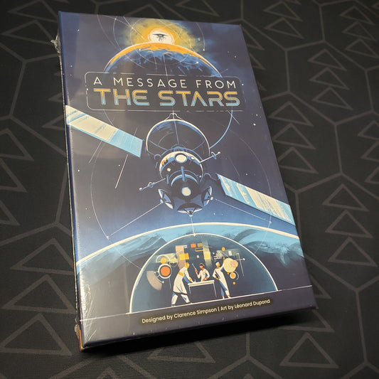 Image shows the front cover of the box for the board game A Message from the Stars