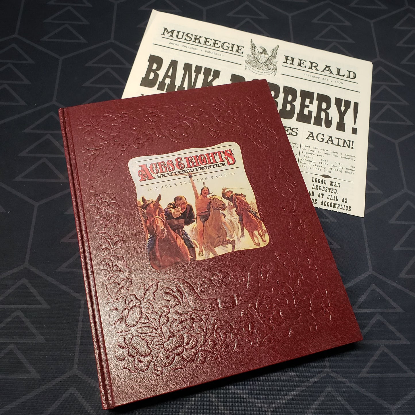 Image shows the front cover of the core rulebook for the roleplaying game Aces & Eights: Shattered Frontier