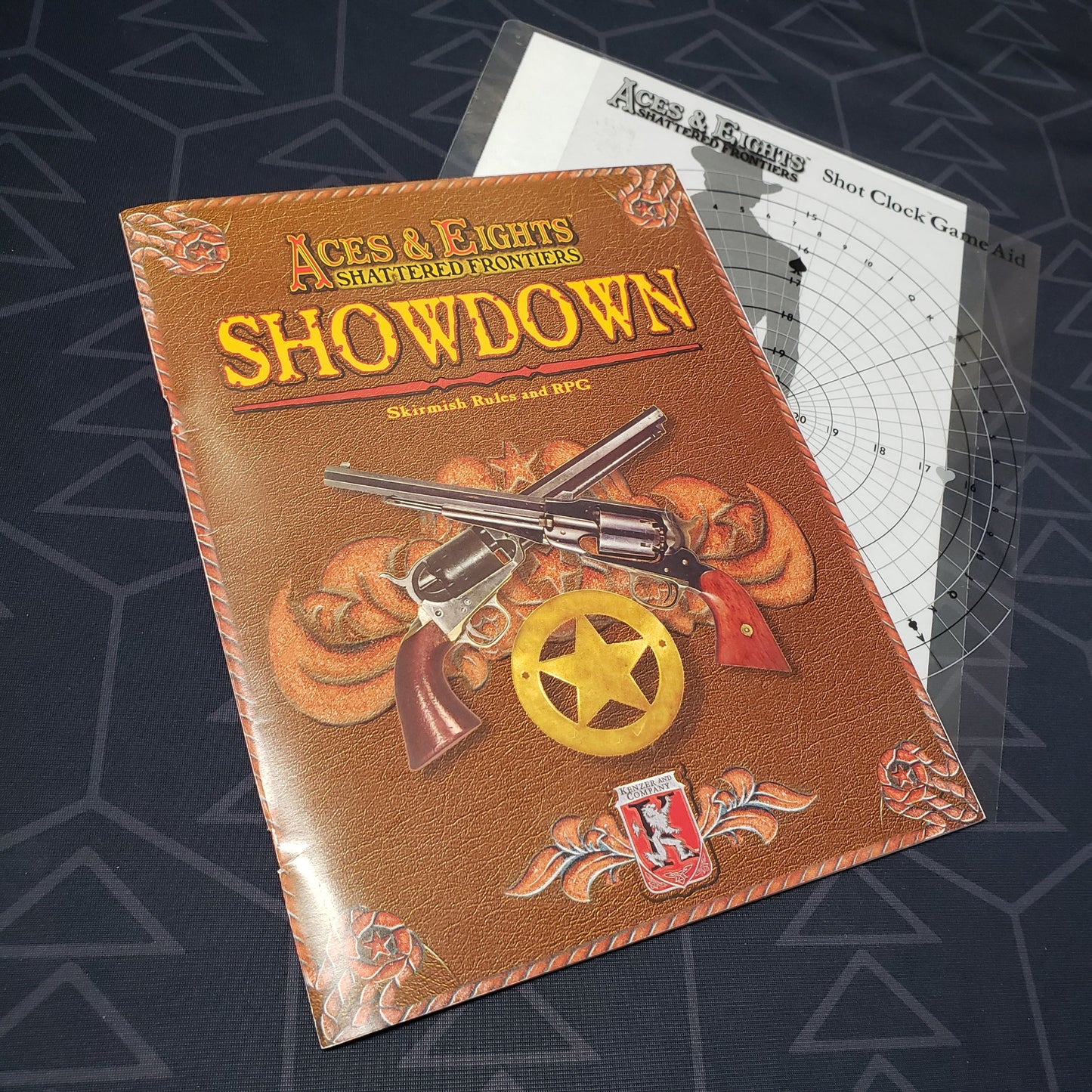 Image shows the front cover of the Showdown Skirmish Rules book for the roleplaying game Aces & Eights: Shattered Frontier