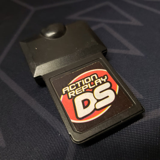 Image shows the front of the cartridge for the Action Replay cheat code device for Nintendo DS