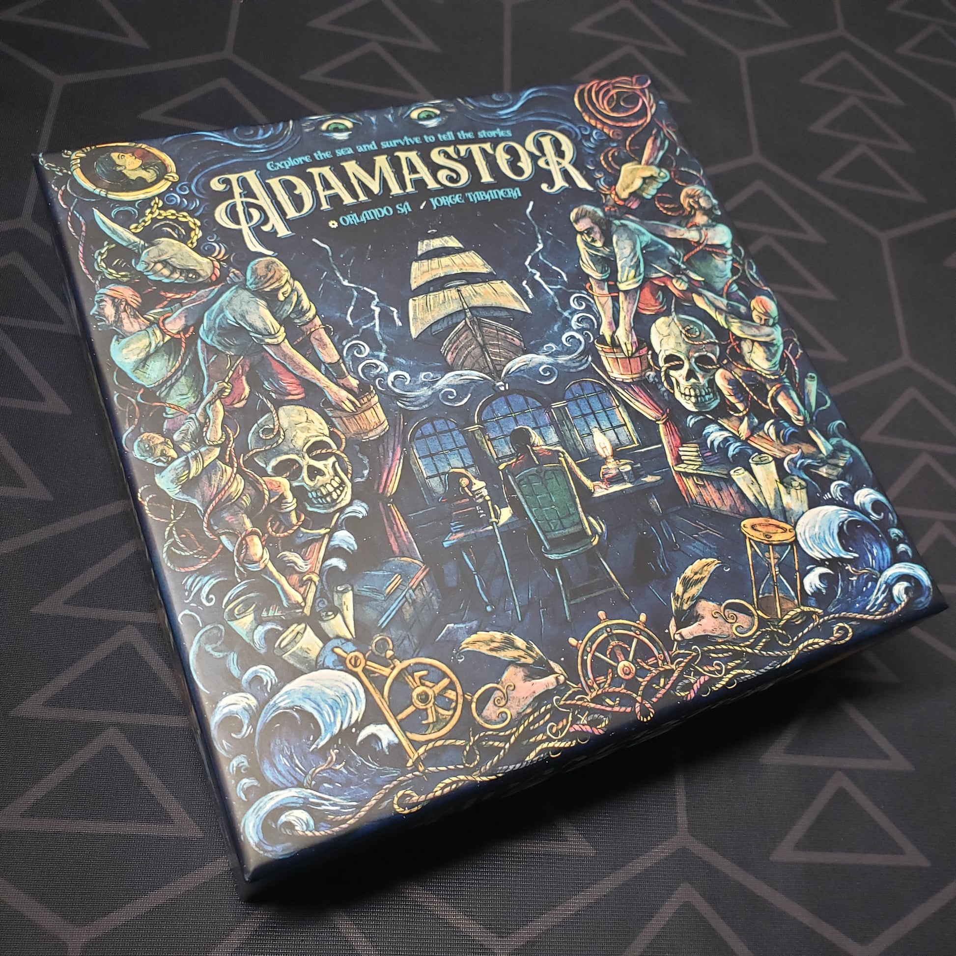 Image shows the front cover of the box for the Adamastor board game
