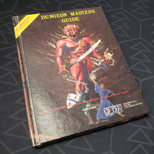 Image shows the Efreet front cover of the 1981 Dungeon Master's Guide book for the roleplaying game Advanced Dungeons & Dragons 1E