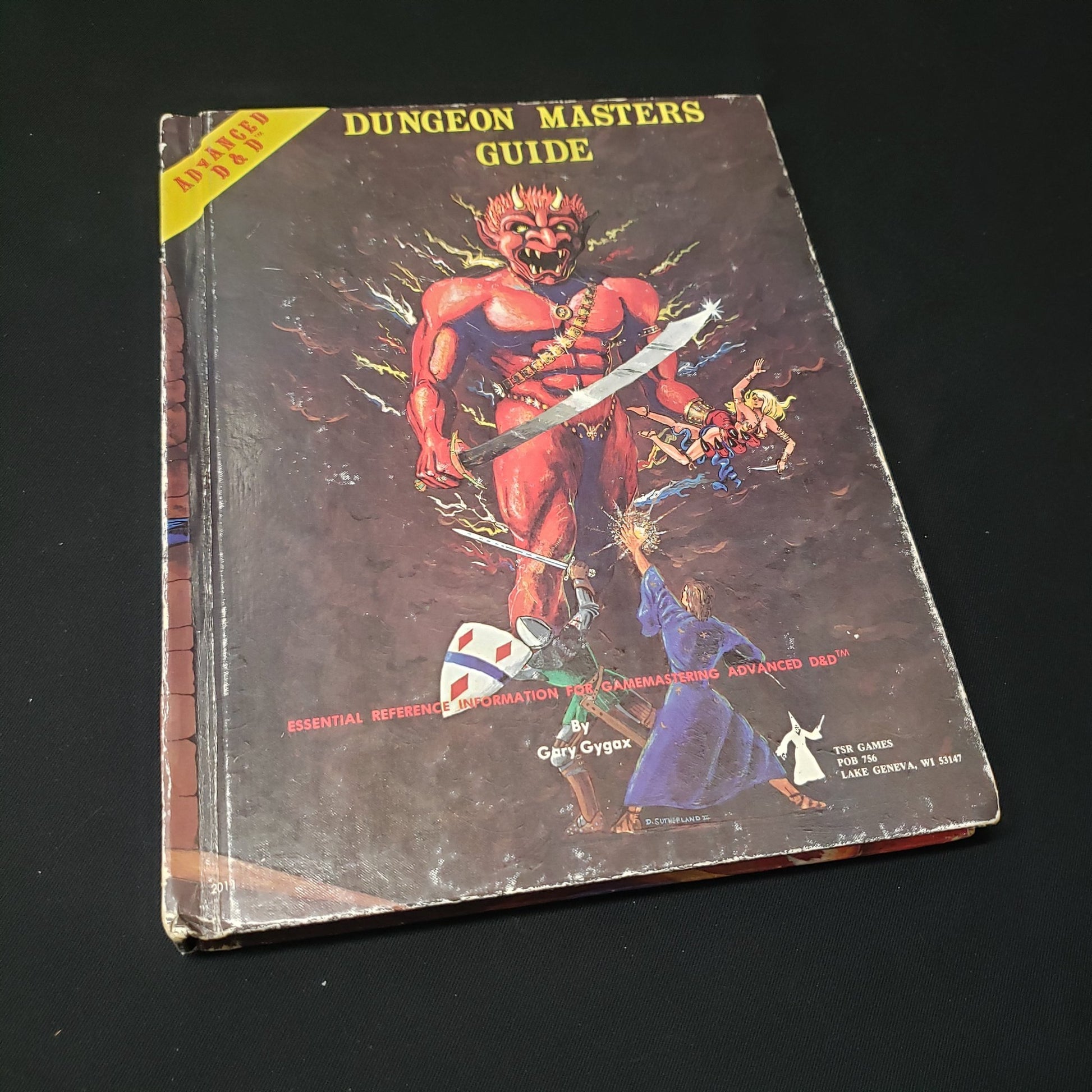 Image shows the front cover of the efreet cover Dungeon Masters Guide book for the roleplaying game Advanced Dungeons & Dragons: First Edition