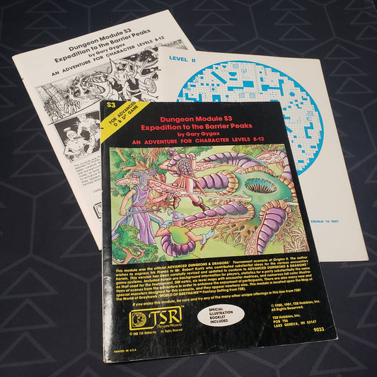 Image shows the front cover of the folio for the Expedition to the Barrier Peaks adventure module for the roleplaying game Advanced Dungeons & Dragons 1E with the booklet & map insert fanned out