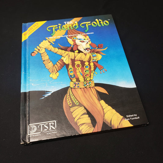 Image shows the front cover of the Fiend Folio book for the roleplaying game Advanced Dungeons & Dragons: First Edition
