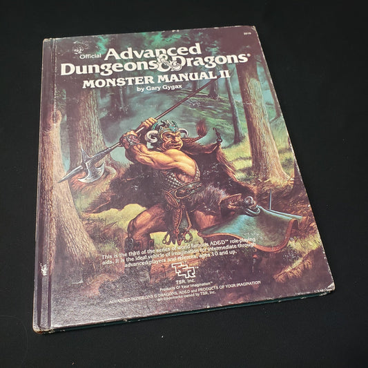 Image shows the front cover of the Monster Manual II book for the roleplaying game Advanced Dungeons & Dragons: First Edition