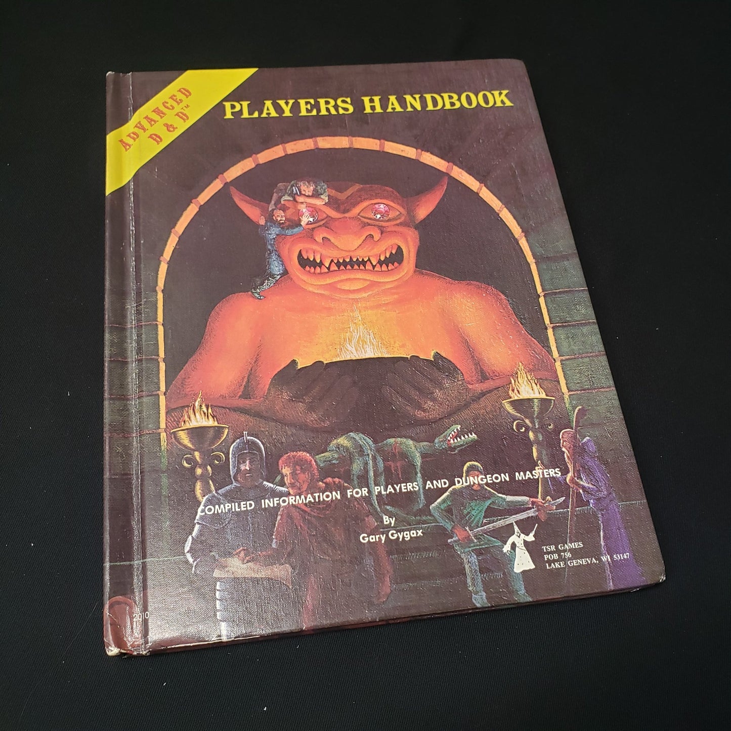 Image shows the front cover of the Players Handbook for the roleplaying game Advanced Dungeons & Dragons: First Edition