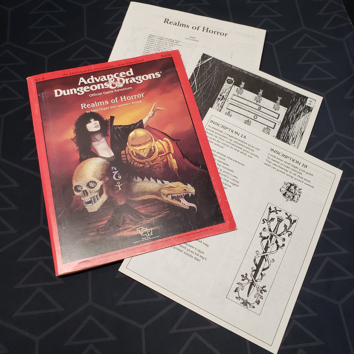Image shows the front cover of the folio for the Realms of Horror adventure module for the roleplaying game Advanced Dungeons & Dragons 1E with the three booklets fanned out