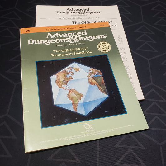 Image shows the front cover of the folio for the Official RPGA Tournament Handbook module for the roleplaying game Advanced Dungeons & Dragons: First Edition, with the booklet fanned out