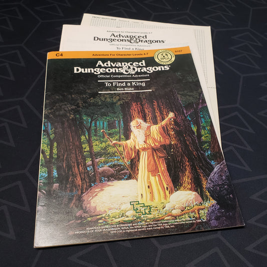 Image shows the front cover of the folio for the To Find a King adventure module for the roleplaying game Advanced Dungeons & Dragons: First Edition, with the booklet and map inserts fanned out