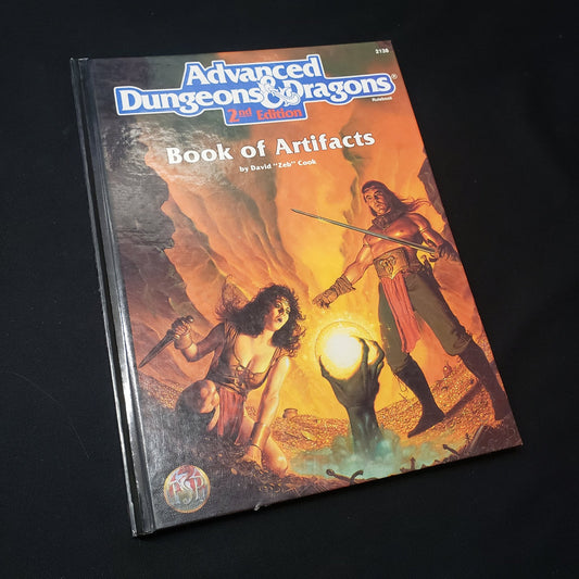 Image shows the front cover of the Book of Artifacts for the roleplaying game Advanced Dungeons & Dragons: Second Edition