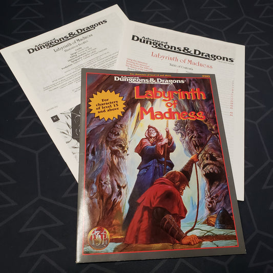 Image shows the front cover of the folio for the Labyrinth of Madness adventure module for the roleplaying game Advanced Dungeons & Dragons 2E with the two booklets fanned out