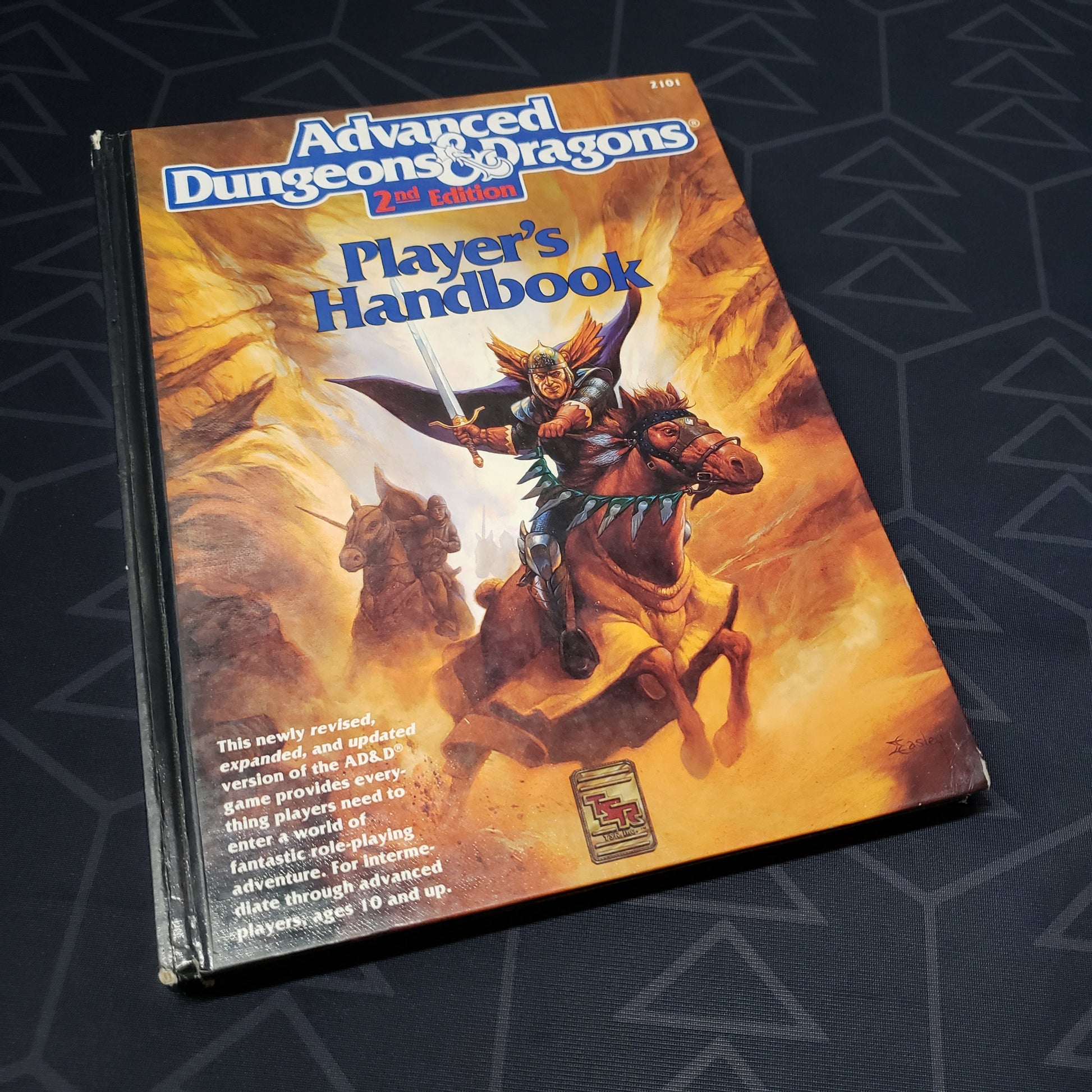 Image shows the front cover of the Player's Handbook for the roleplaying game Advanced Dungeons & Dragons: Second Edition