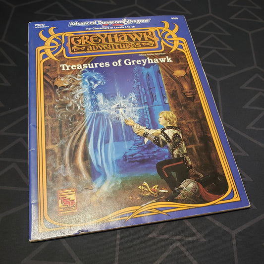 Image shows the front cover of the Treasures of Greyhawk adventure module book for the roleplaying game Advanced Dungeons & Dragons: Second Edition